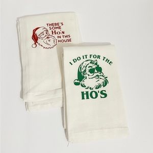 One set of matching Santa Claus Ho’s cheese cloth tea towels